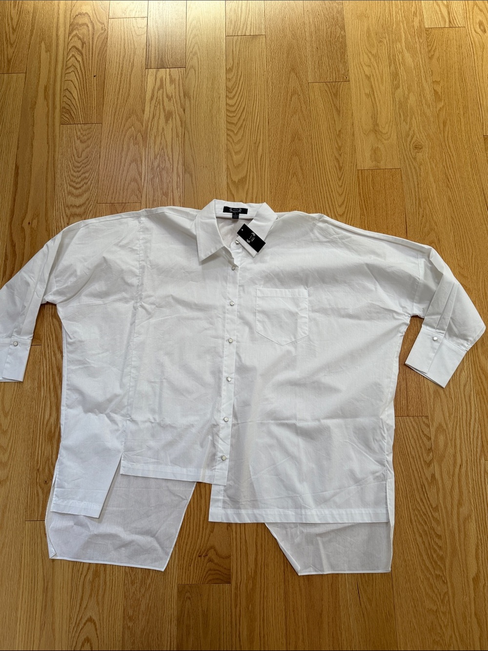 New! A.Z.I white large asymmetrical back crossover top. - Picture 2 of 10